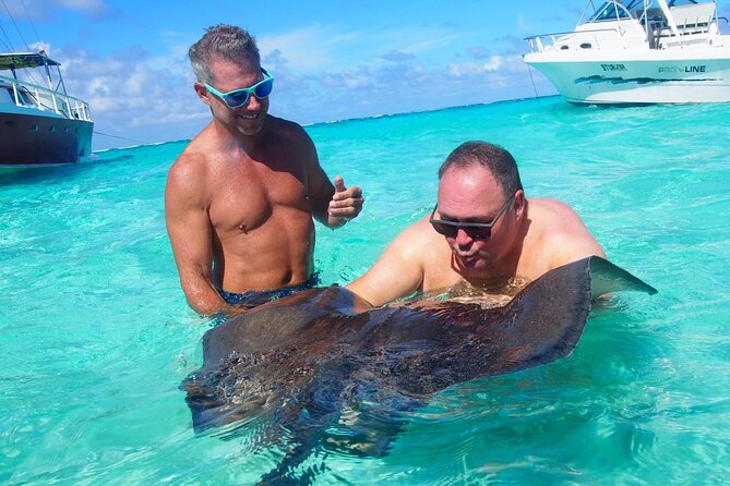 Acquarius Stingray City and Snorkel Tours - The Buccaneer catamaran and the ride from Safehaven Marina