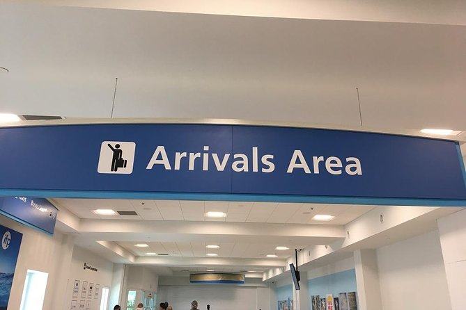 Grand Cayman Shared Airport Transfer - Landing at Owen Roberts Airport and finding your driver