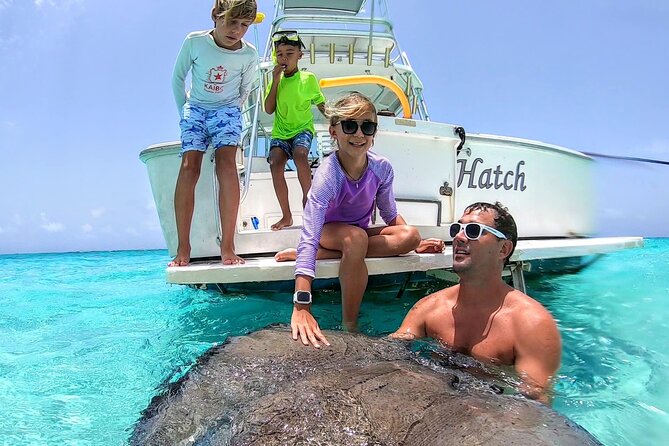 Private Charter 34ft Express Cruiser Stingay City Reef Snorkeling - The 34-foot yacht and what your day feels like on board