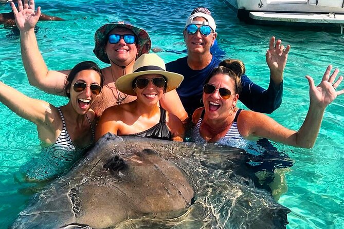 Private Charter 34ft Express Cruiser Stingay City Reef Snorkeling - Reef snorkeling with fish, turtles, eels, and lobster