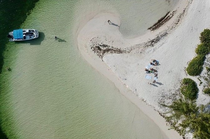 Private, Guided Boat Charters in The Cayman Islands - Rum Point and Kaibo add food and a drink