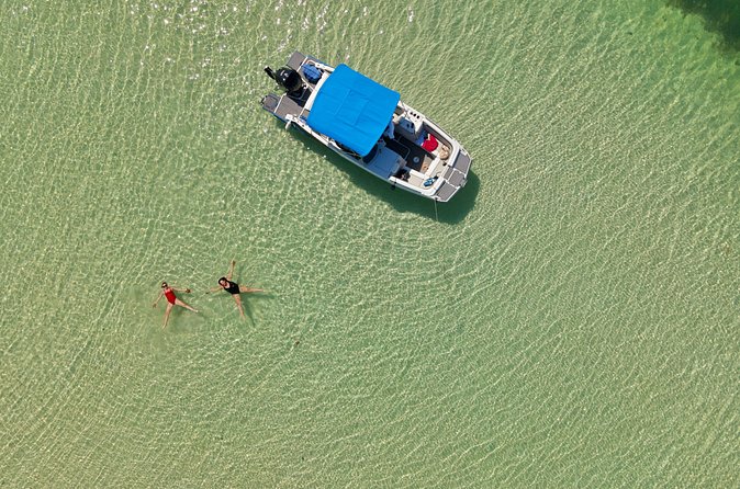 Private, Guided Boat Charters in The Cayman Islands - Sunrise and bioluminescence change the entire outing