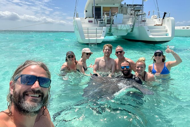 Private Luxury Catamaran Tour to Stingray City and Snorkel - Meeting Southern Stingrays at the shallow sandbar
