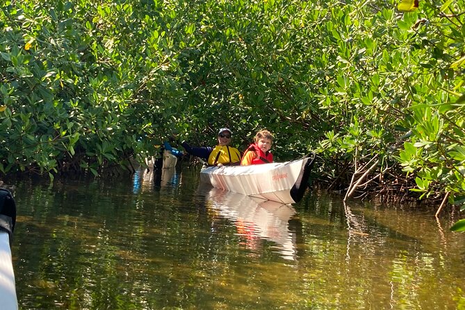 Small Group Glass Bottom Kayak Adventure- Cayman Islands - Single or double kayak, with one important catch